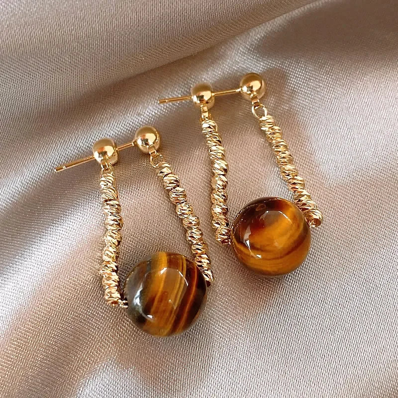 Boucles d'Oreilles Œil de Tigre Dorées – 12 Modèles : Puces, Pendantes, Créoles, Cœurs