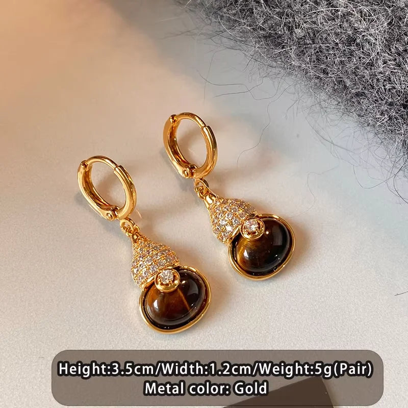 Boucles d'Oreilles Œil de Tigre Dorées – 12 Modèles : Puces, Pendantes, Créoles, Cœurs