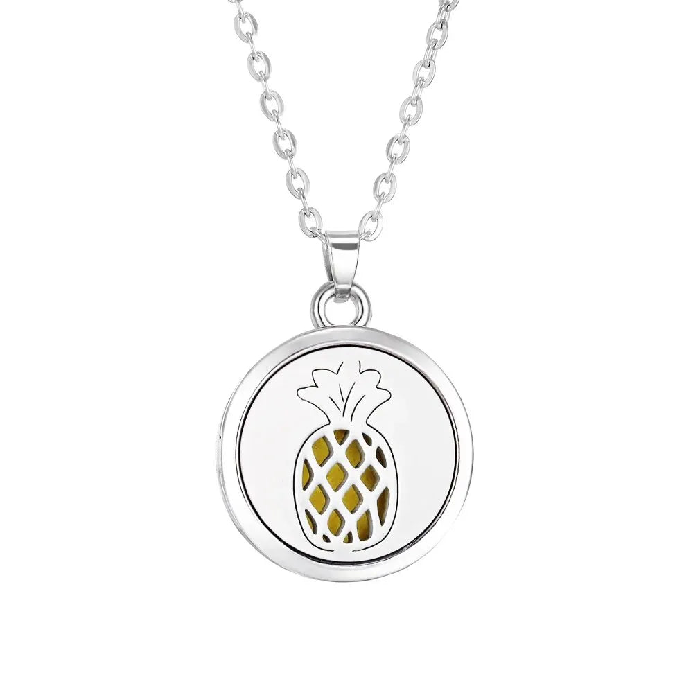 Collier Diffuseur d'Huiles Essentielles en Acier – Médaillon Arbre de Vie, Lotus, Fleur de Vie, 15 Motifs